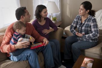 Breastfeeding Peer Counseling Mom and Dad with Baby